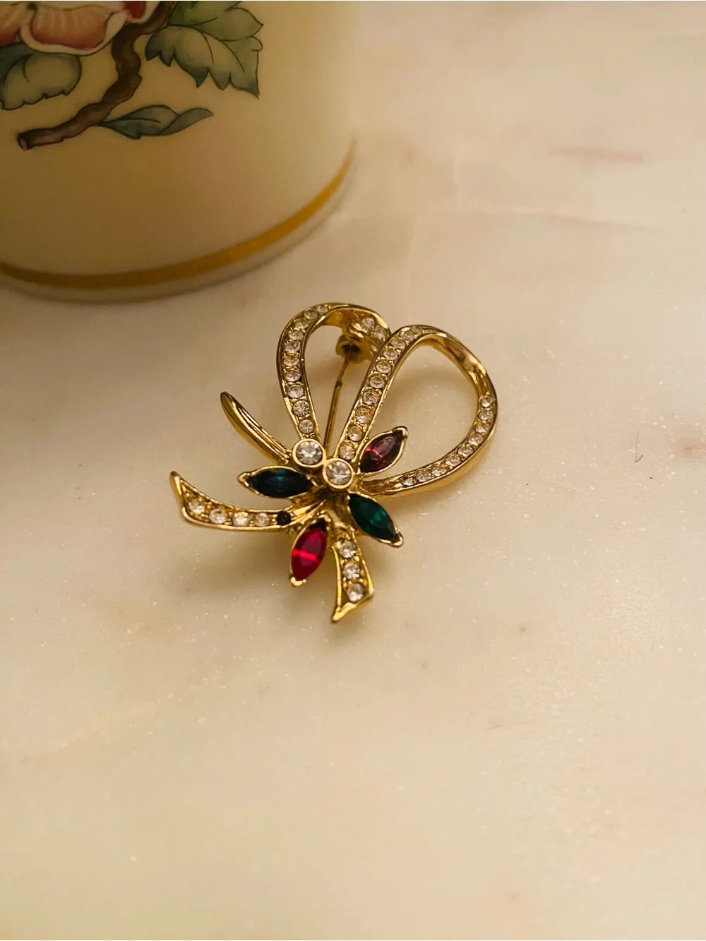 Gold-Tone Crystal Ribbon Brooch with Multi-Colored Gem Accents (Like New)